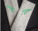 Beautiful woollen fingerless gloves -light grey with green kiwiana koru embroidery
