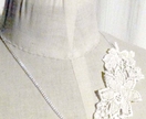 vintage white lace applique on silver chain 