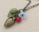 Wild Strawberry: nature-inspired cluster necklace with ladybird